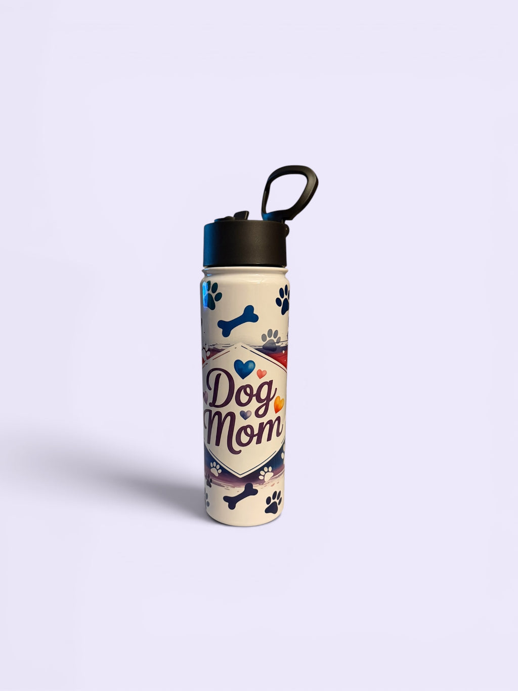 Water bottle with 'Dog Mom' design on a light purple background